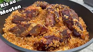 Riz gras soumbala au mouton sautÃ© ou viande